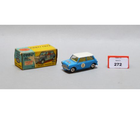 A boxed Corgi Toys, 227 Morris Mini Cooper 'Competition Model', in blue with white roof, crossed flags decals to bonnet and R