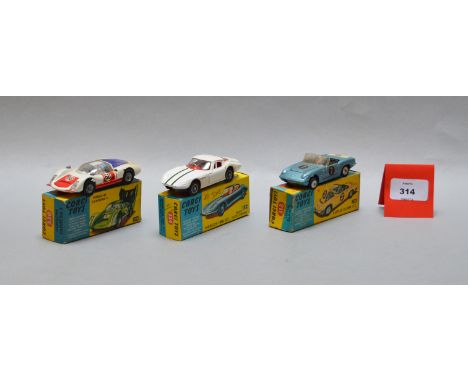 Three boxed Corgi Toys diecast model cars, 318 Lotus Elan, 324 Marcos 1800 GT and 330 Porsche Carrera. Overall models appear 