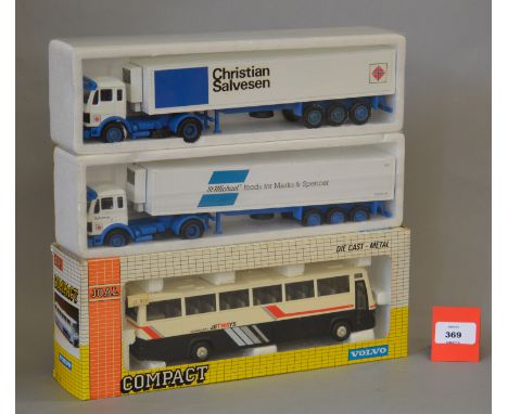 A boxed Joal #149 Volvo Coach 'Jetways' in 1:50 scale, VG in VG box together with two NZG diecast Articulated Truck models in