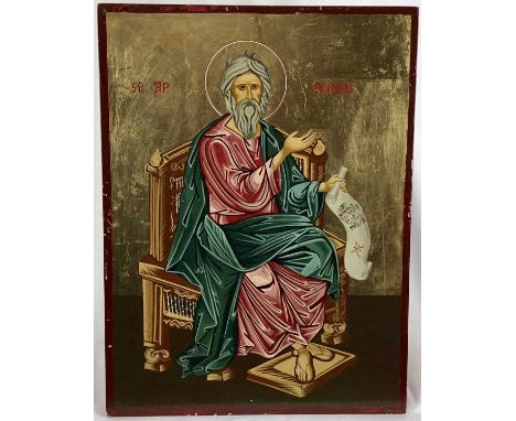 A Greek icon of St. Andrew seated on a throne, oil on panel, inscribed. 40 x 30cm