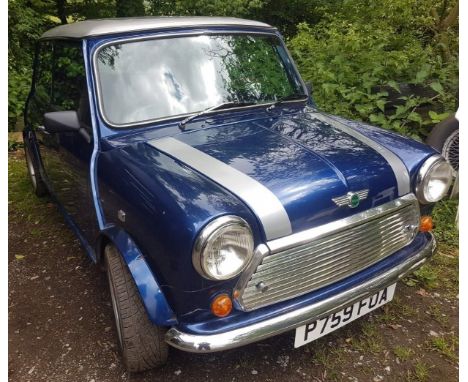 1996 Rover MiniRegistration number P759 FOASilver over blue with a half leather interiorAlloy wheelsCooper style stripesBuilt