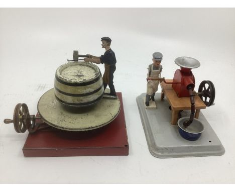 Fleischmann German Nuremberg Tin plate working butcher and sausage grinder working toy 1950s together with a good DC Made in 