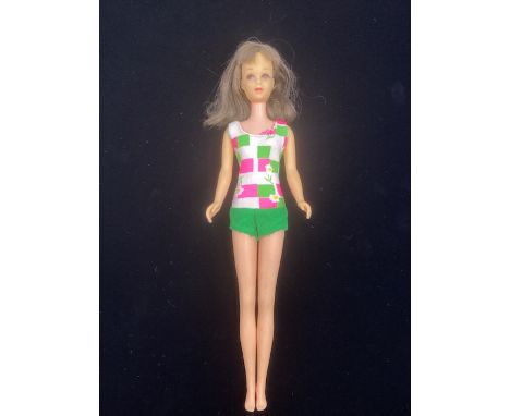 Mattel Francie barbie cousin vintage doll, with dark hair and original swimsuit( and a 2nd  spare with damage too) click leg 