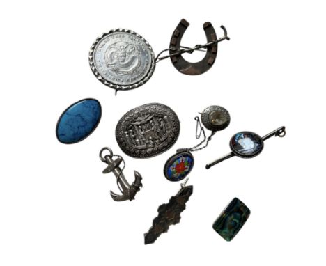 Vintage and antique silver brooches to include a hallmarked silver brooch in the form of a horseshoe with whip, an lozenge sh