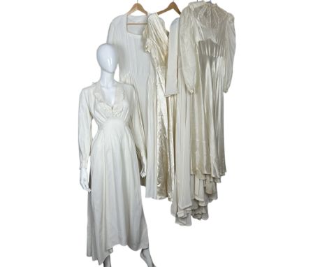 A group of 5 vintage 1930s/ 1940s wedding dresses to include an soft cream satin dress with short sleeves and shirring to the