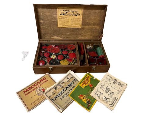 Wooden original Meccano box contains WW2 era Meccano Outift No3 and selection of parts within the original wooden clasped box