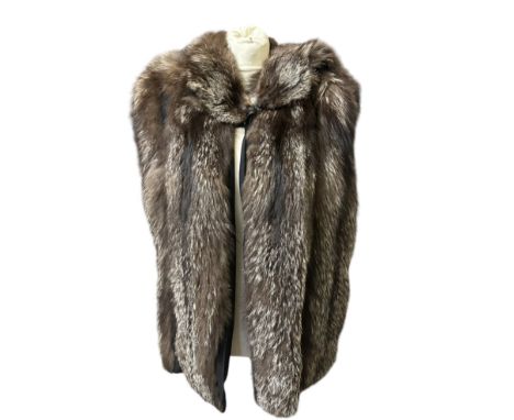 A 1930s fox fur cape by Revillon Freres and a 1950s astrakhan coat a/f plus four fur stoles, an early 1940s taxidermy alligat