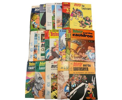 33 70s and 80s vintage Asterix books to include Asterix in Britain 1973 paperback, Asterix the Gaul 1972 hardback, Asterix an