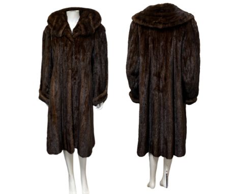 Vintage fur to include a 1950s stranded ranch mink coat with shawl collar and charmeause lining (damage to silk), three musqu