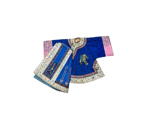 Chinese Lady's Robe Qing Dynasty Late 19th Century in a rich cobalt blue damask with pink cuffs and ivory and pink borders. T