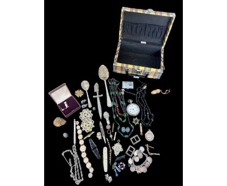 An interesting collection of costume jewellery and other items to include a vesta case in the form of a skull made from brass