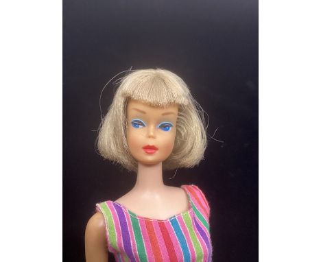 Mattel Barbie 1965 American girl vintage doll ; good bright face paint and a longer bobbed hair , slight play in the  hip of 