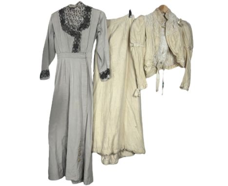 A mid 1910s dress in a grey-mauve grosgrain with bullion embroidered net modesty panel and padded bullion embroidery trim and