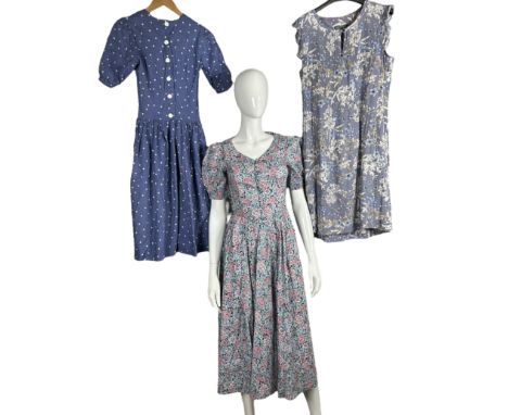 A vintage 1980s Laura Ashley dress with short, puffed sleeves and button front, sz 10 but more like an 8 today, a later Laura