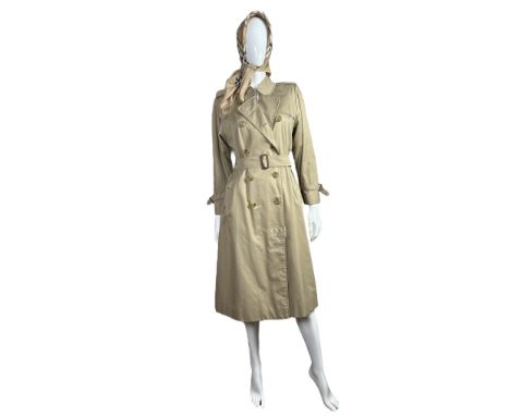 A classic Burberry&rsquo;s trench coat with horn buttons and Burberry check lining. Made to order &ldquo;RG61642/01&rdquo; , 