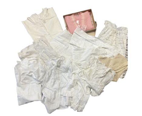 A vintage knitted bed jacket c1940s/50s in a card box along with a baby doll dress or nightie (adult sized) that looks to hav