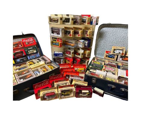 Very large vintage diecast  collection of boxed Lledo Days Gone boxed vehicles alongside a Dinky Toys porsche amongst others.