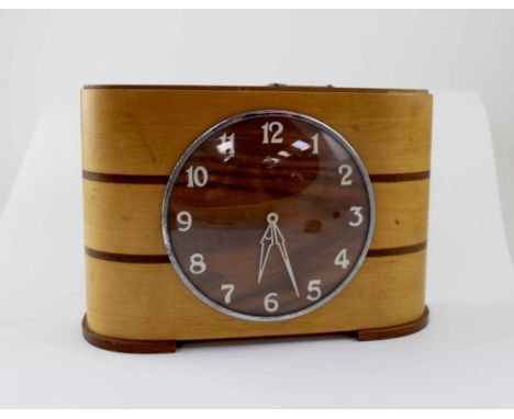 Three 1920s/30s oak-cased mantel clocks to include one 'Weekly Saver' money bank clock (3). CONDITION REPORT Please note that