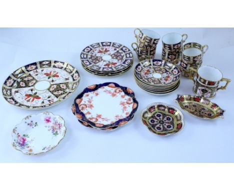 A Royal Crown Derby part dinner/ tea set, pattern 2451 comprising large plate, four side plates, six saucers, four cups, also