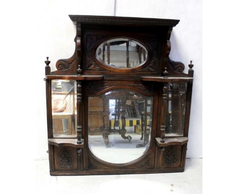 An Edwardian mahogany overmantel mirror carved with turned uprights, height 110 x 100cm and one other mirror with arched top 