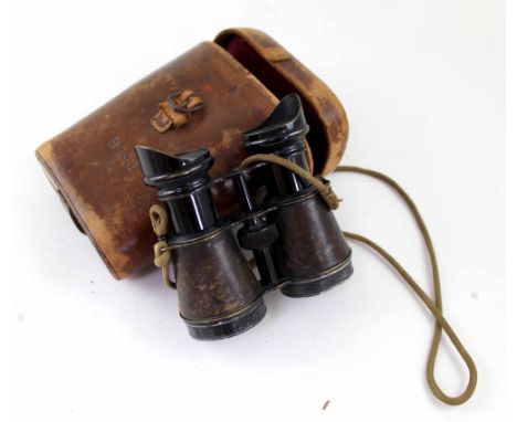 A pair of vintage Iris De Paris sporting binoculars in military leather binocular case stamped 3441 and bearing broad arrow m
