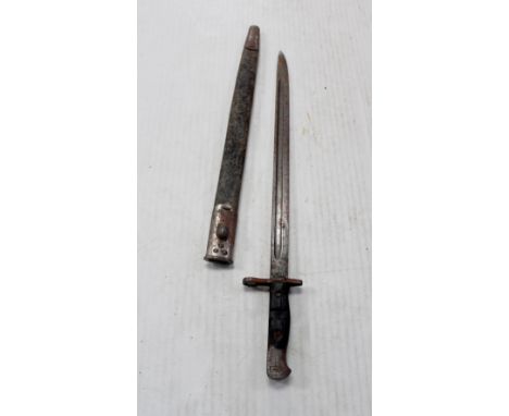 A British pattern 1907 bayonet with mark 1 scabbard. CONDITION REPORT In poor to average condition.Please note that this lot 