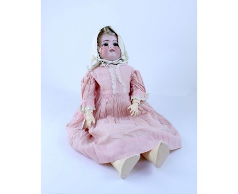 A German bisque headed doll, stamped 'DCP Germany HANDWERCK 3' with composite joints, in contemporary clothes, height 56cm.