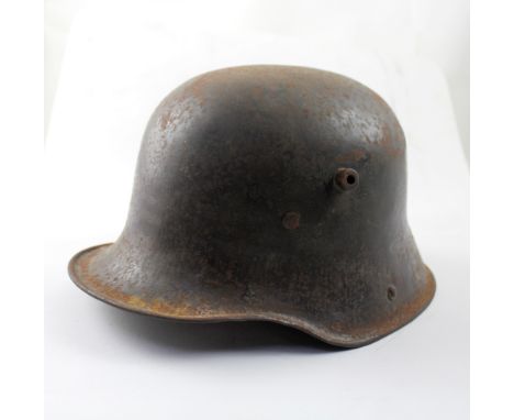 A German WWI MI6 helmet, unmarked.