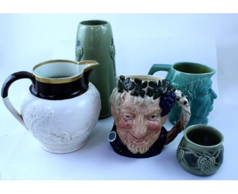 A mixed group of pottery to include a 19th century Hollins tavern jug with ring turned neck, embossed hunting scene depicting