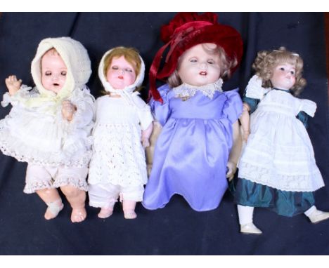 Seven antique and vintage medium-size dolls to include an Armand Marseille example, 930.1 ½ M, with open eyes and open mouth,