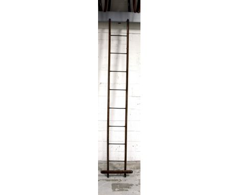 A pair of late 19th/early 20th century pole ladder with concertina action comprising eight steel hinged rungs, height when op