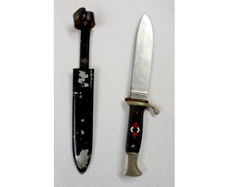 A German Third Reich Hitler jugend in reproduction sheath. CONDITION REPORT In average condition.  Scabbard does not fit the 