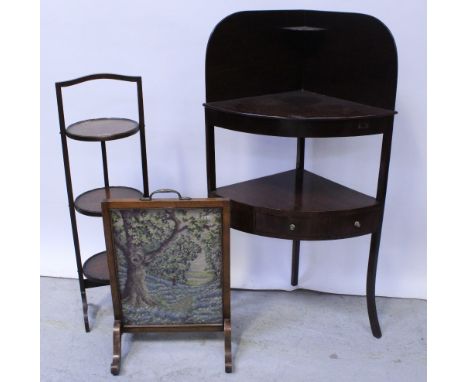 A Victorian mahogany corner washstand with lower drawer tier, an embroidered oak-framed fire screen and a folding three-tier 
