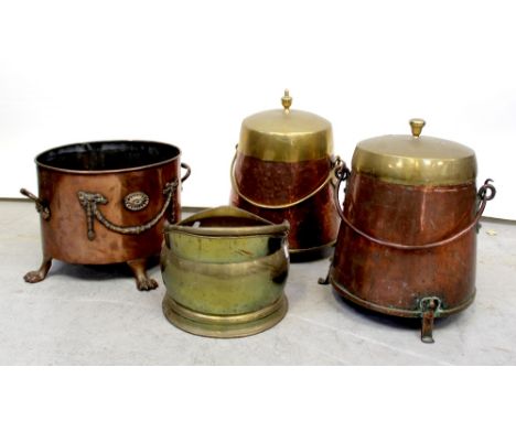 A near pair of 19th century brass and copper coal buckets, one with copper body on three copper feet and handle with brass li