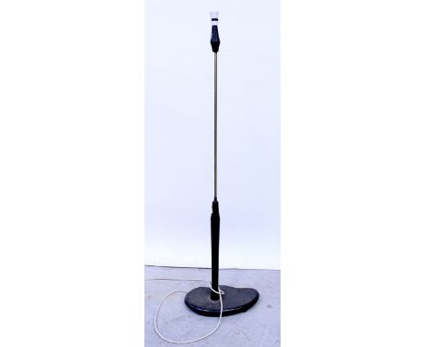 A mid-century standard lamp, the brass column on a stained wooden abstract shaped base, height 147cm. CONDITION REPORT Please