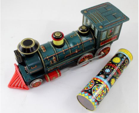 A 1960s vintage Japanese 'Western' battery-powered tin plate toy train and an 'Acme Toys' tin plate kaleidoscope (2). CONDITI