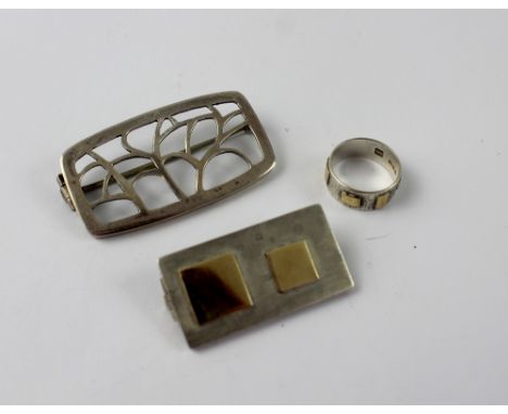 A silver designer brooch with matching pattern ring, maker's mark H with S in upper arms and G below, the brooch marked Londo