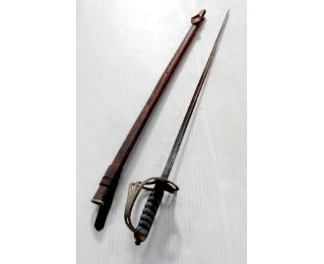A WWI Royal Artillery officer's sword in leather covered scabbard. CONDITION REPORT In poor to average condition.Please note 