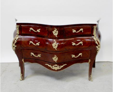 A Louis XV style marquetry inlaid mahogany bombé commode with grey marble top and gilt metal mounts, height 80cm, width 127cm
