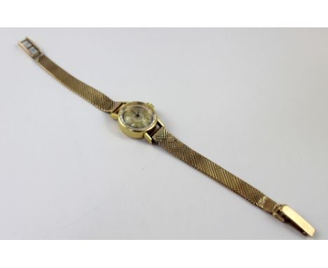 An Eterna ladies' wristwatch with 18ct gold case and 9ct gold strap, approx 14gm of 9ct gold. CONDITION REPORT Case back stam