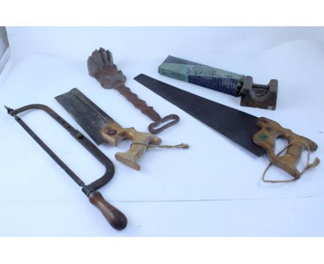 A mixed lot of vintage tools to include grease guns, hand drills, saws, also a quantity of vintage oil cans.