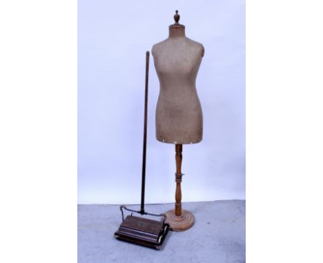 A vintage oak-framed tailors' dummy with canvas body and a vintage wood bodied Ewbank carpet sweeper (2).