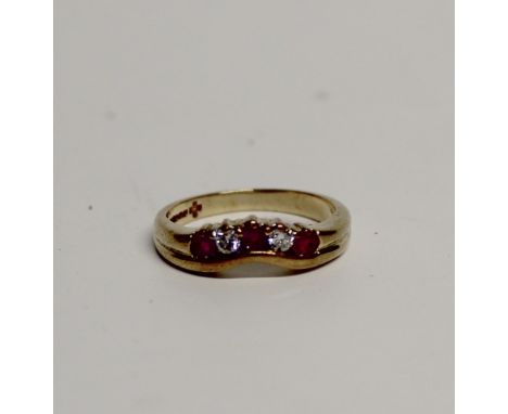 A 9ct yellow gold, ruby and diamond dress ring, size L, approx 2.9g.