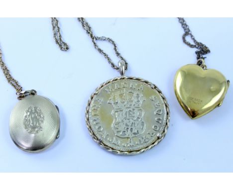 Two yellow metal lockets, one oval with partial enamel blue belt on engine turned ground on 9ct fine necklace, the other of h