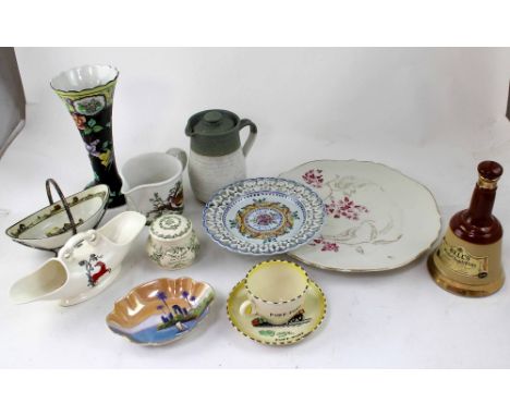 Various items of collectable pottery including Bells decanter, a large Spanish bull charger, 'Old Woodstock' tall vase, two h