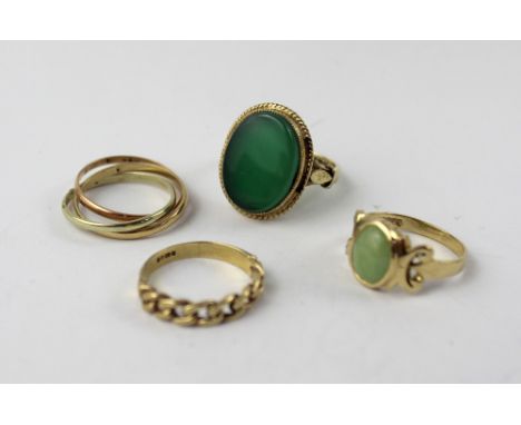 A 9ct gold dress ring set with a large oval green stone, size I, a 9ct gold ring set with oval pale green stone, size J, a 9c