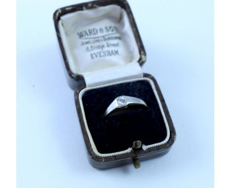 A yellow metal ring set with solitaire diamond in a white metal surround, maker's mark AWG &amp; S Ltd, size O, approx 2.7g.