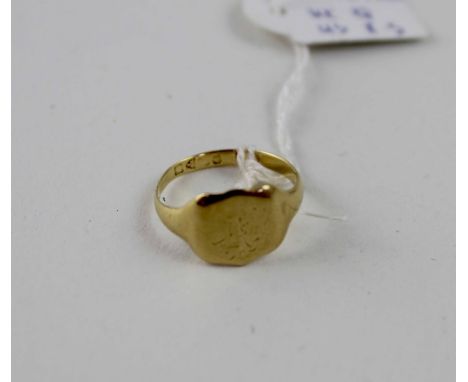 A 9ct gold signet ring of shield form, rubbed initials to middle. Chester hallmarked, approx 3.9g.