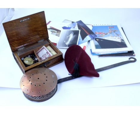 An early 20th century metal bound oak gaming box containing assorted games and chrome cribbage board, copper chestnut roaster