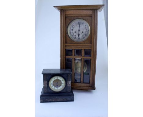 An oak-cased regulator wall clock, height 70cm and a black slate mantel clock (2) CONDITION REPORT Please note that this lot 